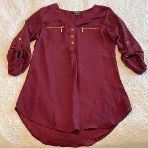 Medium maroon top with gold accents